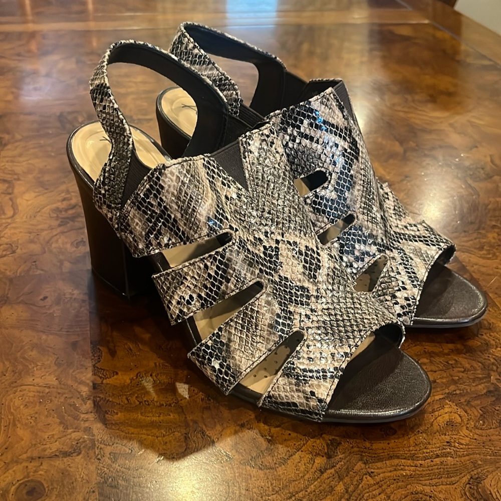 Abella snake print sandals.